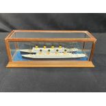 R.M.S. TITANIC: Models of Titanic and Olympic in a glazed case. 10ins.