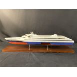 MARITIME: Composite desk top model of a five speed ferry on a treen base.