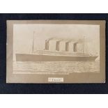 R.M.S. TITANIC: Rare post-disaster privately printed postcard of Titanic at sea.