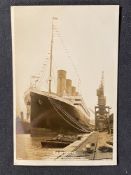 R.M.S. TITANIC: H Symes real photo postcard of Titanic at Southampton.