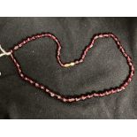 Costume Jewellery: Garnet bead necklace, approx. 30 beads, 18ins.