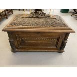 Period Gothic oak sarcophagus shaped cellarette with heavily carved domed lid and partially