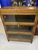 20th cent. Oak Globe Wernecke style glass fronted bookcase with three shelves. Height 46ins. Width