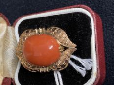 Jewellery: Ring yellow metal tests 14ct, set with oval cabochon pink and white coral. 8g.