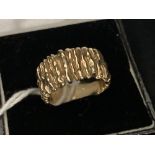 Jewellery: Yellow metal ring granulated bark finish, tests 14ct. 7.6g.