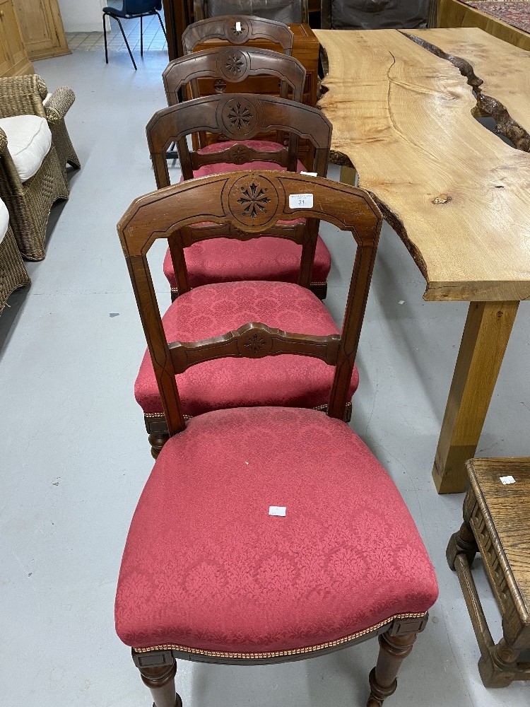 19th cent. Mahogany Gothic dining chairs with sabre leg rear supports. Set of four.