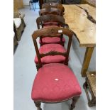 19th cent. Mahogany Gothic dining chairs with sabre leg rear supports. Set of four.