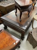 Chinese hardwood coffee table with three drawers, on stylised feet. 30ins. x 60ins. x 18ins.