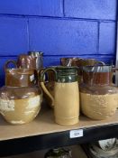19th/20th cent. Doulton Lambeth Stoneware: Lidded ale jugs & pitchers, mainly harvest pattern (8).