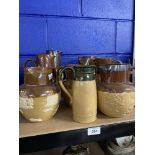 19th/20th cent. Doulton Lambeth Stoneware: Lidded ale jugs & pitchers, mainly harvest pattern (8).