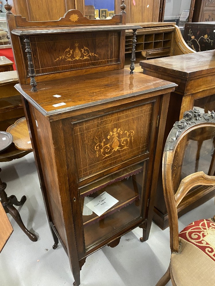 Edwardian rosewood music cabinet with inlaid decoration motif above, glazed. 21½ins. x 52ins high