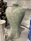 20th cent. Oriental pale green baluster shaped vase, slender neck rim decorated with cranes and