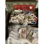 Cigarette Cards: Loose leaf albums containing complete and part sets (7). Forty pocket sleeves