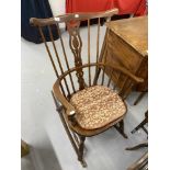 20th cent. Beech Windsor style stick back rocking chair and an early 20th cent. English beech