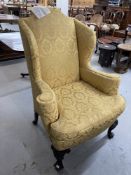 18th/19th cent. Queen Anne style wingback upholstered chair on cabriole supports with acanthus