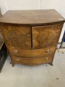 20th cent. Bow front mahogany cupboard with two drawers. 26ins.