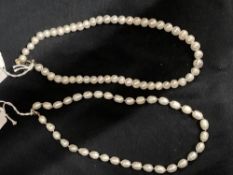 Jewellery: Two freshwater pearl necklaces, both 18ins long.