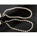 Jewellery: Two freshwater pearl necklaces, both 18ins long.