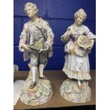 Late 19th early 20th cent. German figurines, man and woman picking flowers, multicoloured