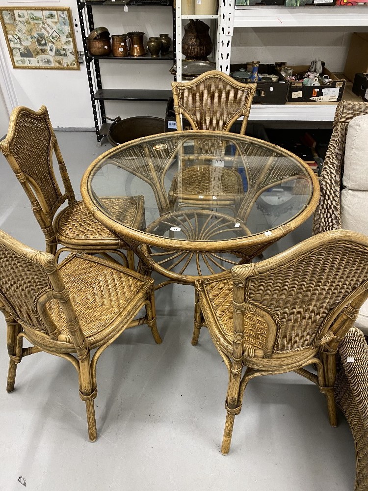 21st cent. Wicker conservatory set. Sofa, armchairs, footstools, dining table and four chairs.