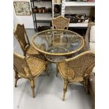 21st cent. Wicker conservatory set. Sofa, armchairs, footstools, dining table and four chairs.