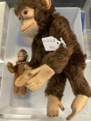 Toys: Mid 20th cent. Brown plush monkey with felt face, hands and feet, height 10ins. Plus miniature
