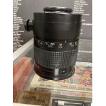 Photographic Equipment: Rubinar MC 500mm f5·6 Macro lens with sepia filter and case.