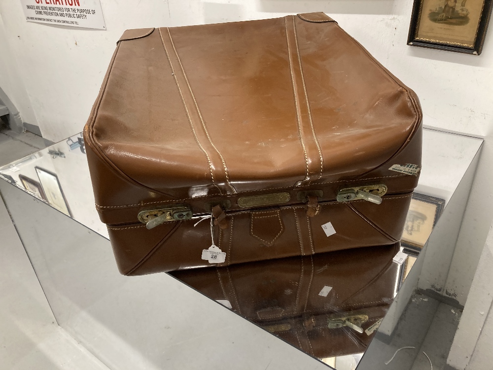 Vintage Luggage: Oblong leather suitcase with shot silk lining. 23ins. x 19ins. x 12ins.