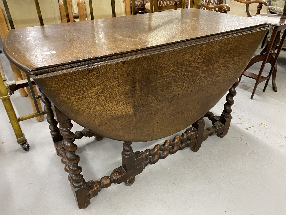 18th/19th cent. Oak gate leg dining table with barley twist supports. 46ins.