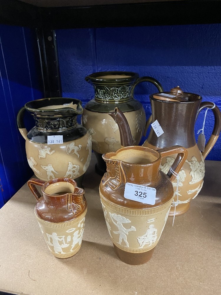19th/20th cent. Doulton Lambeth Stoneware: Two Egyptian ware jugs 5ins. & 6½ins. two Persian ware
