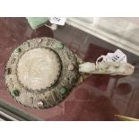 Chinese: White metal mirror set with white jade carved centre surrounded by coloured stones, the