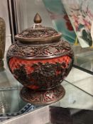 Mid 20th cent. Chinese black on red cinnabar lacquer baluster shaped vase, floral pattern roses