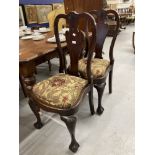 18th cent. Rosewood dining chairs, acanthus splat backs on ball and claw supports. A pair.
