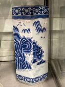 20th cent. Chinese pale blue of cylindrical polygon shape decorated in blue willow pattern. Crack to