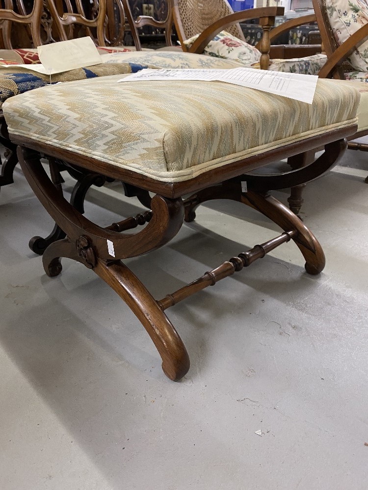 Mid 19th cent. Rosewood cross stretcher upholstered footstool with applied rose motifs.