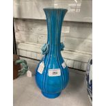 Chinese turquoise glazed bottle vase, pear shaped body supporting a slender neck, with two dragon