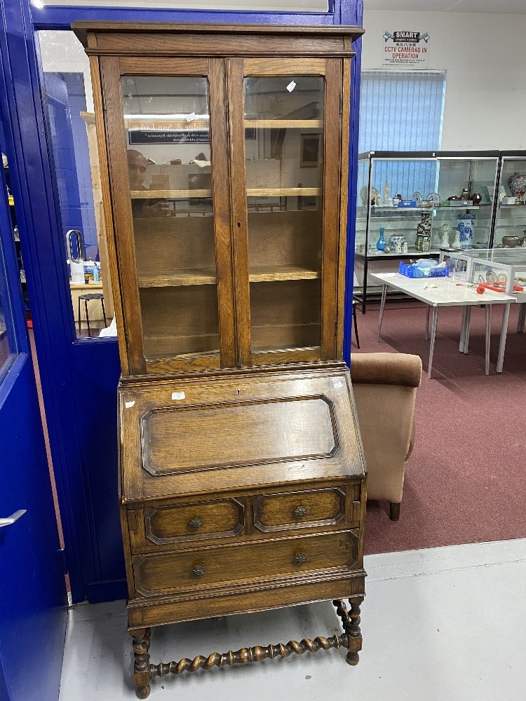 20th cent. Oak bureau bookcase with glazed top and turned stretchers.