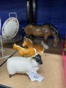 20th cent. Ceramics: Beswick Palamino foals, one standing, one laying, black face sheep, and shire