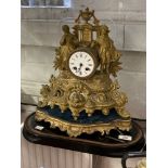19th cent. French gilt Spelter mantle clock, modelled with two figures on base and stand 14ins ex