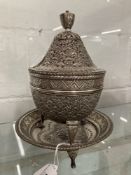 Chinese white metal tests as 800 standard, lidded pot with tripod stand decorated with double headed