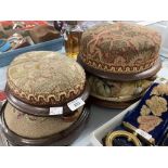 19th cent. Circular footstools, all on mahogany bases, one with tapestry upholstery, one Berlin bead