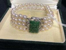 Jewellery: Bracelet consisting of four rows of 6.5mm cultured pearls, twenty three per row (92) in