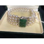 Jewellery: Bracelet consisting of four rows of 6.5mm cultured pearls, twenty three per row (92) in