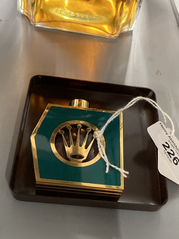 20th cent. Parfum Rolex fragrance 'Perpetually Yours', gilt metal container, Rolex trademark, single