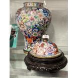 20th cent. Cloisonné baluster shaped Oriental vase, profusely decorated with multi-floral designs on