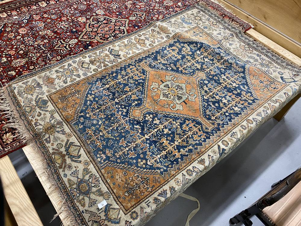 20th cent. Blue ground Persian rug. 66ins. x 50ins.