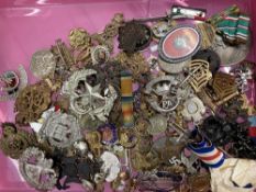 Militaria: 20th cent. Cap and other badges plus several unattributed WWII medals.