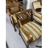Early 20th cent. Beech armchairs with spring upholstered seats, fretwork backs and turned front