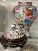 20th cent. Cloisonné baluster shaped Oriental vase, profusely decorated with multi-floral designs on
