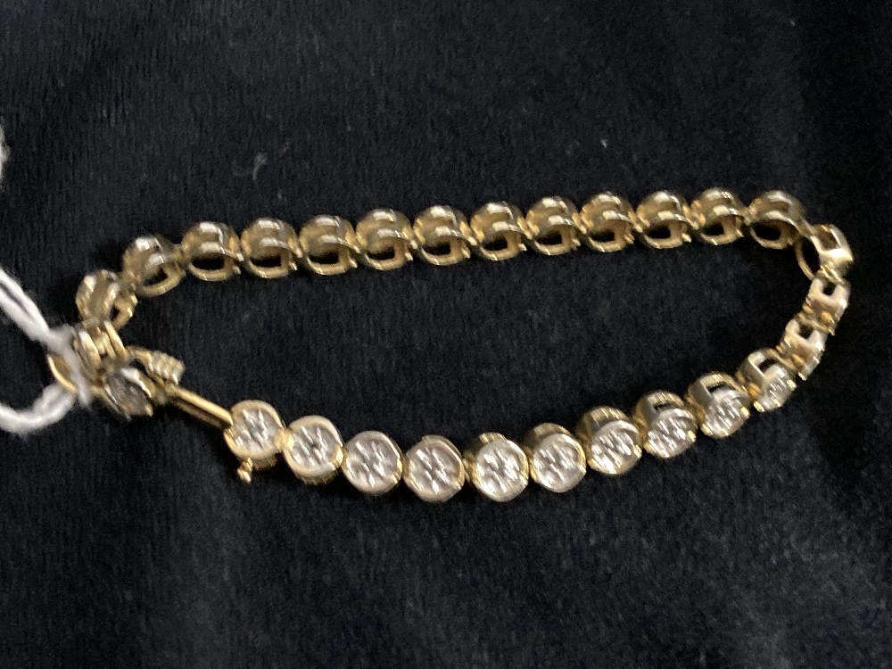 Jewellery: Yellow metal bracelet with disc links, each set with a single diamond, twenty eight in - Image 2 of 2